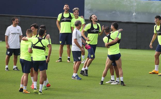 Los jugadores, en el entrenamiento de este domingo.