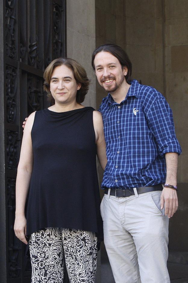 Ada Colau y Pablo Iglesias. :: QUIQUE GARCíA / afp/