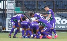 Los malaguistas celebran el gol./Agencia Lof
