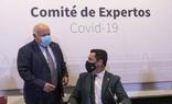 Aguirre, con Moreno en una reunión del comité de expertos./E. Press