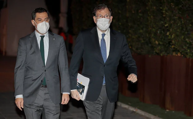 Juanma Moreno, este lunes en Sevilla con Mariano Rajoy.